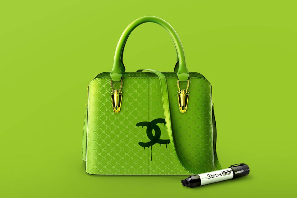 A purse with a fake Chanel logo drawn in Sharpie