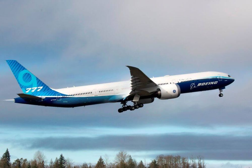 A Boeing 777X airplane takes off on its inaugural flight at Paine Field in Everett, Washington on January 25, 2020.