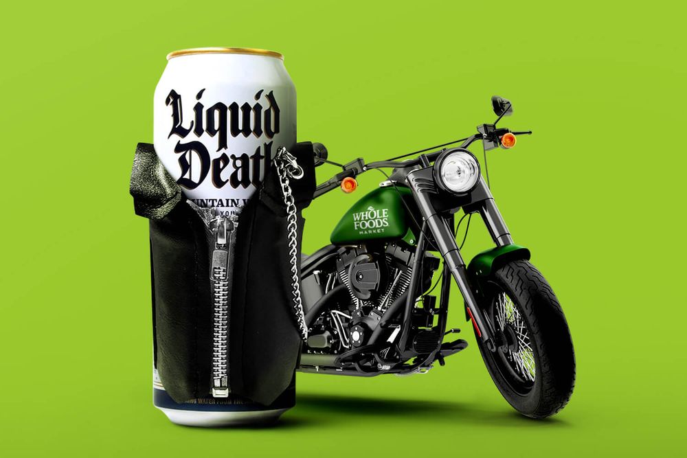 A Liquid Death can wearing a leather jacket next to a motorcycle