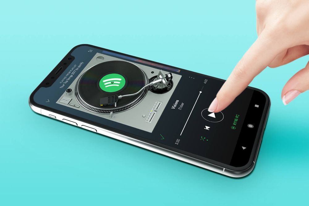 An image of the Spotify logo as a vinyl record on a smartphone 