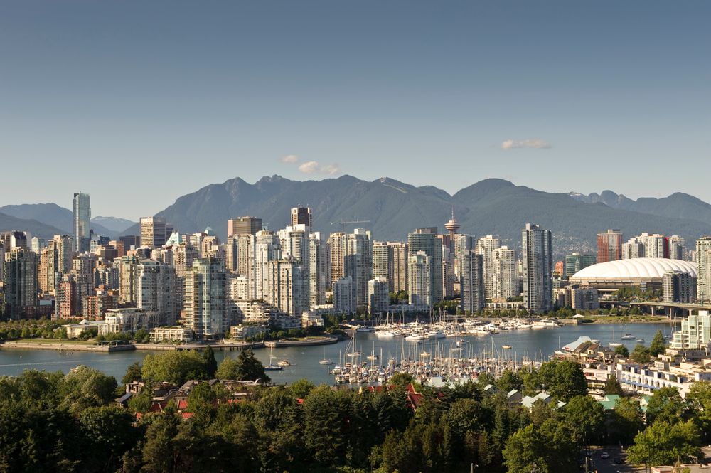 A view of the skyline of downtown Vancouver with False Creek in the fore...