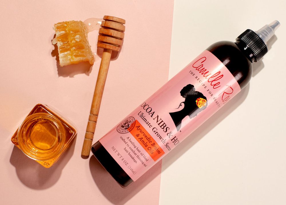 Camille Rose products on a pink background