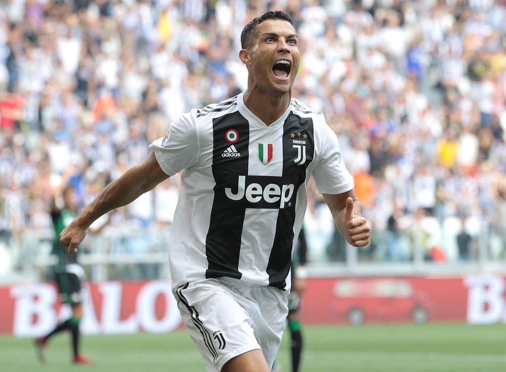 TURIN, ITALY - SEPTEMBER 16:  Cristiano Ronaldo of Juventus FC celebrate...