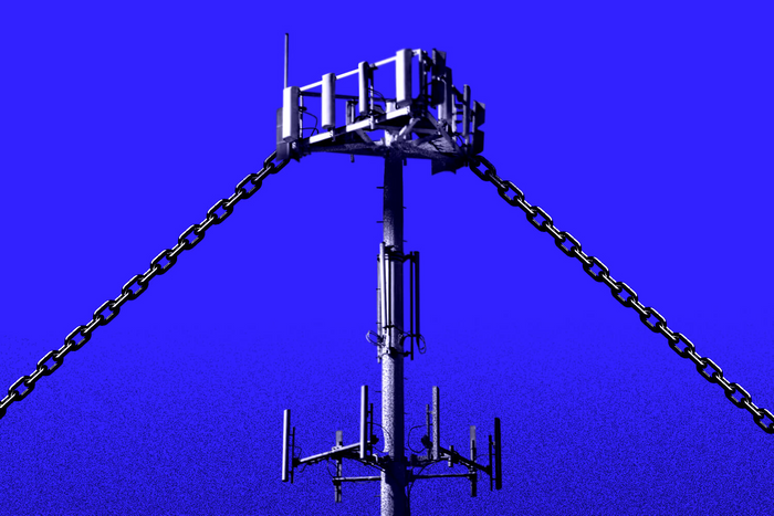 Mobile network tower with chains attached