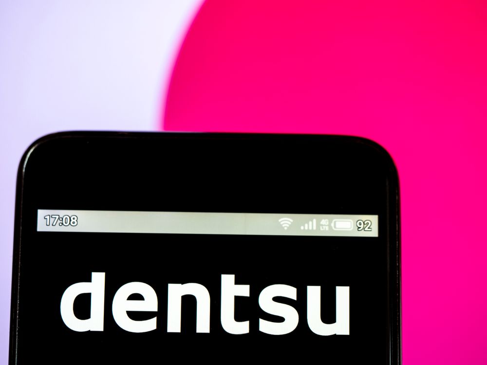 UKRAINE - 2019/04/01: In this photo illustration a Dentsu Inc. logo seen...