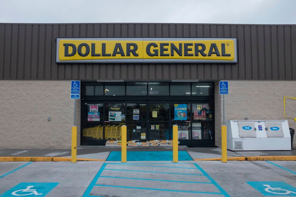 Sand bags lay in front of the main doors of a Dollar General in Plaquemi...