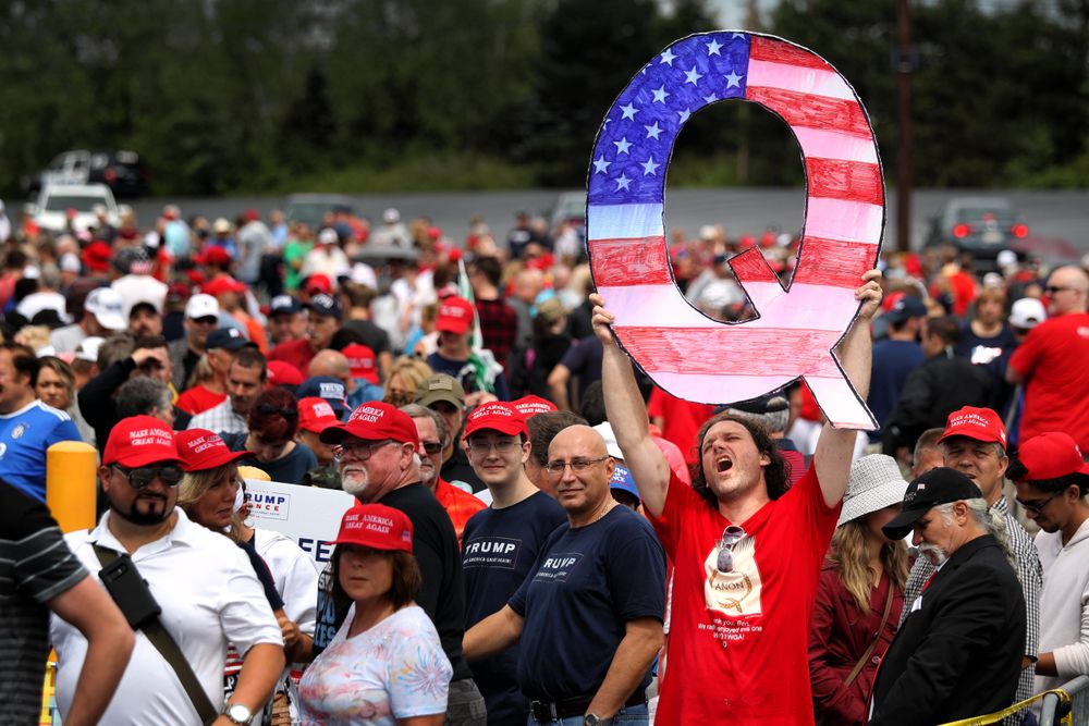 WILKES BARRE, PA - AUGUST 02: David Reinert holds up a large "Q" sign wh...