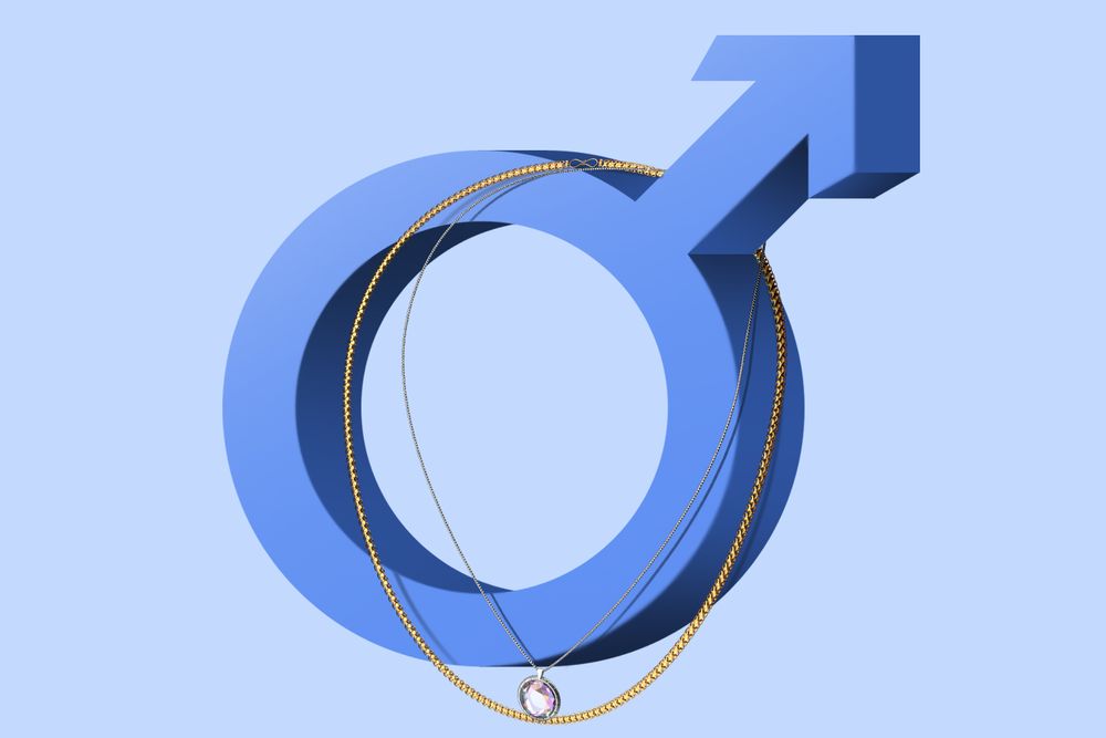 necklaces hanging from male gender sign 