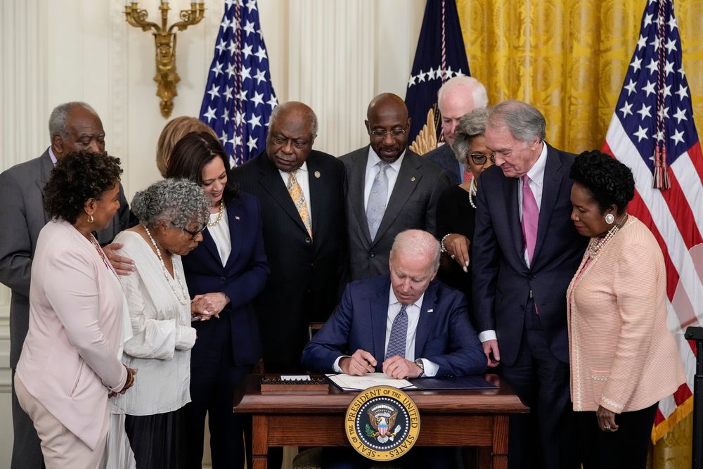 WASHINGTON, DC - JUNE 17: U.S. President Joe Biden signs the Juneteenth bill