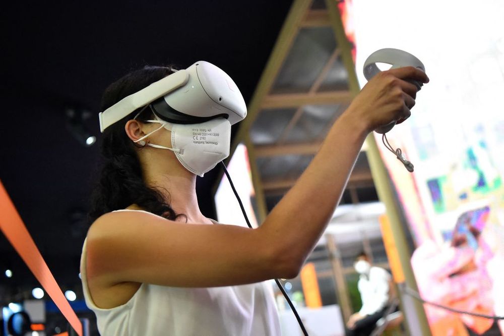 Woman trying a virtual reality headset 