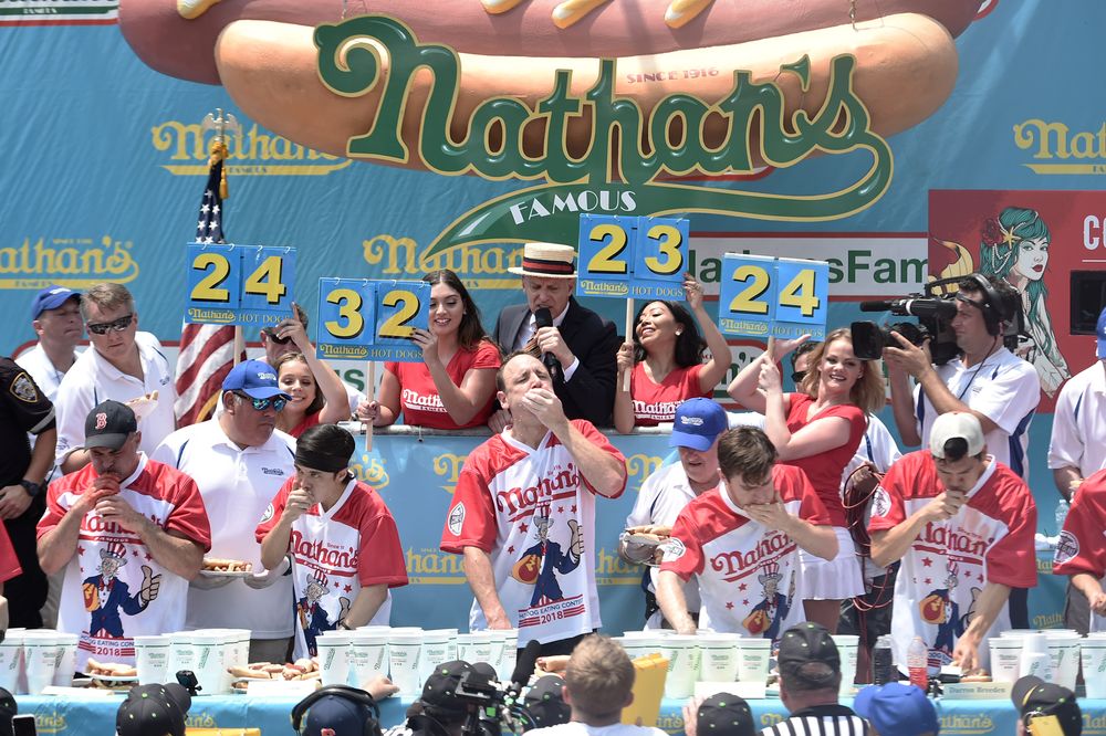 NEW YORK, NY - JULY 04:  Matt Stonie, Joey Chestnut, and Carmen Cincotti