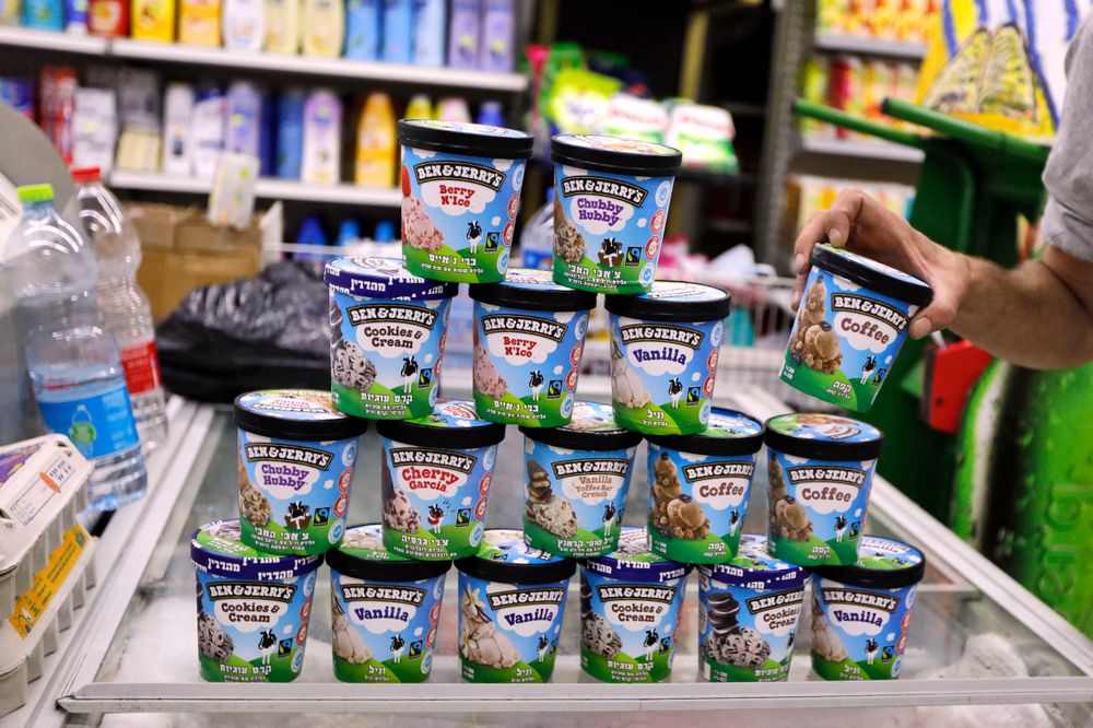 A man buys Ben & Jerry's ice cream in Jerusalem on July 20, 2021. - Amer...