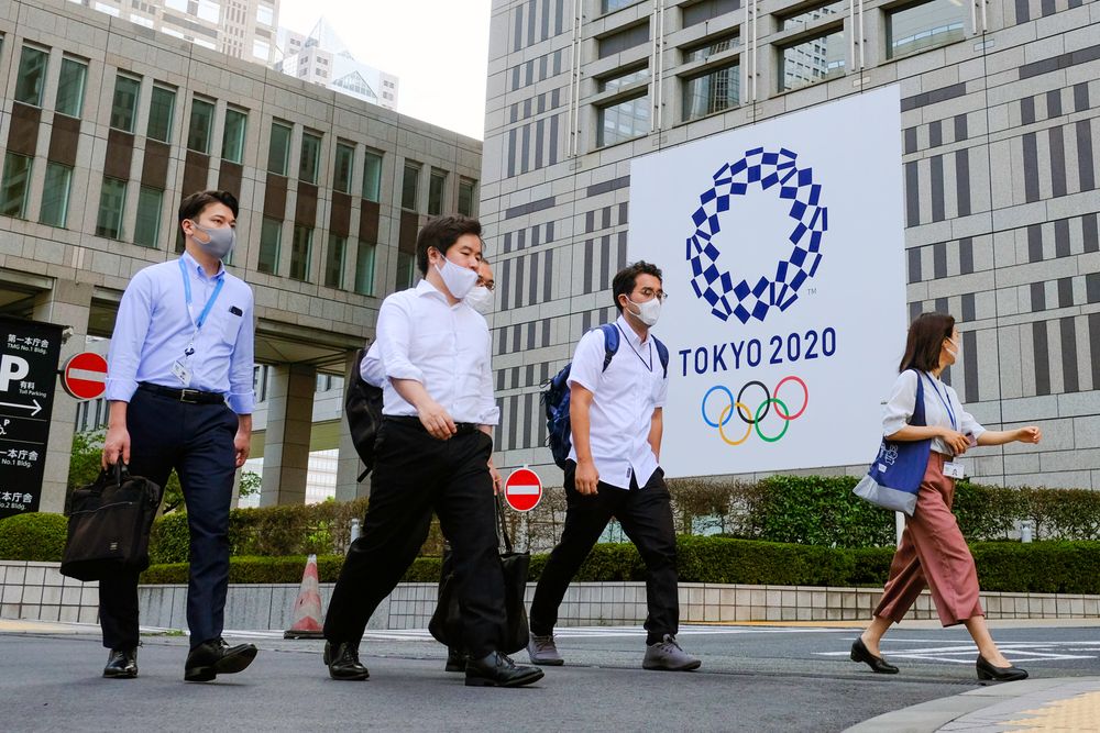 TOKYO, JAPAN - 2021/06/25: People wearing masks as a preventive measure