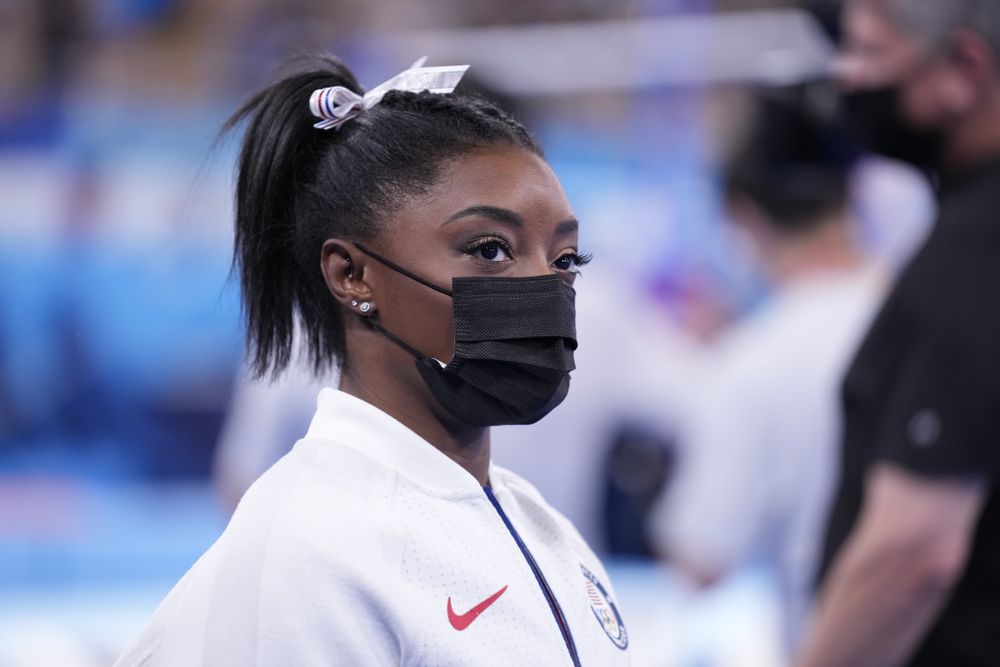 TOKYO, JAPAN - JULY 27: Simone Biles of Team United States looks on duri...