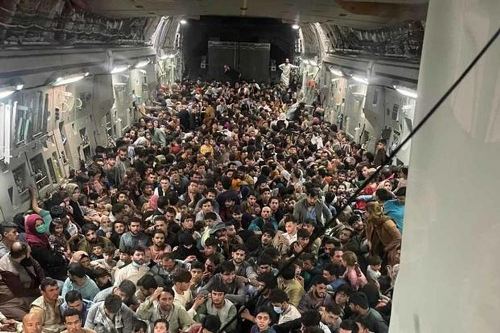 Evacuation of Afghan citizens in a C-17 cargo plane