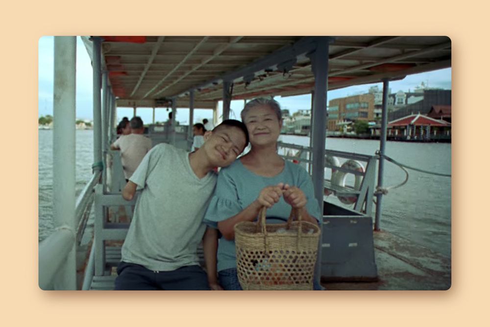 two people on a boat in a Paralympic Games ad