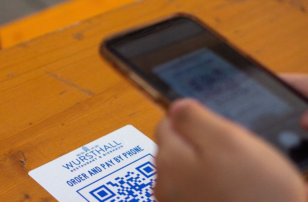 Phone scanning QR code at resturant