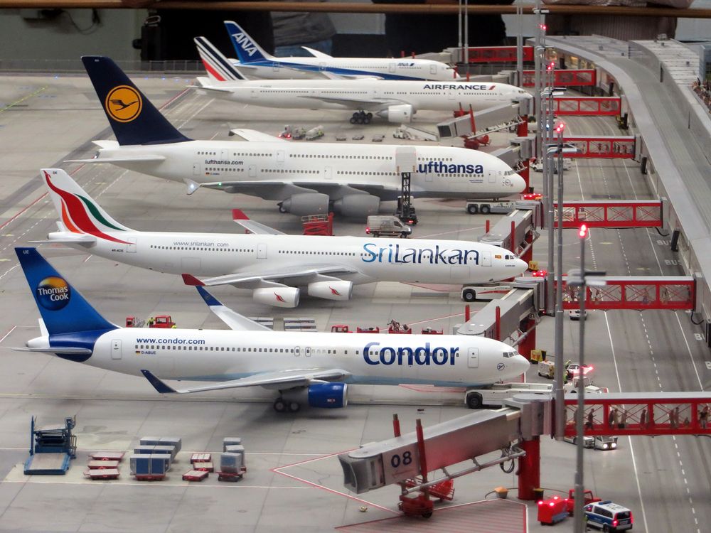 Planes lined up at an airport