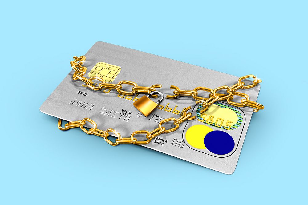 Credit card with a broken lock to suggest consumer confidence rose 