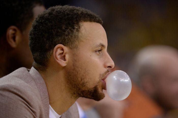 Steph Curry blowing a bubble