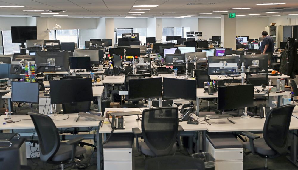 BOSTON, MA - MARCH 10:  Nearly empty desks at the Fuze office in Boston ...