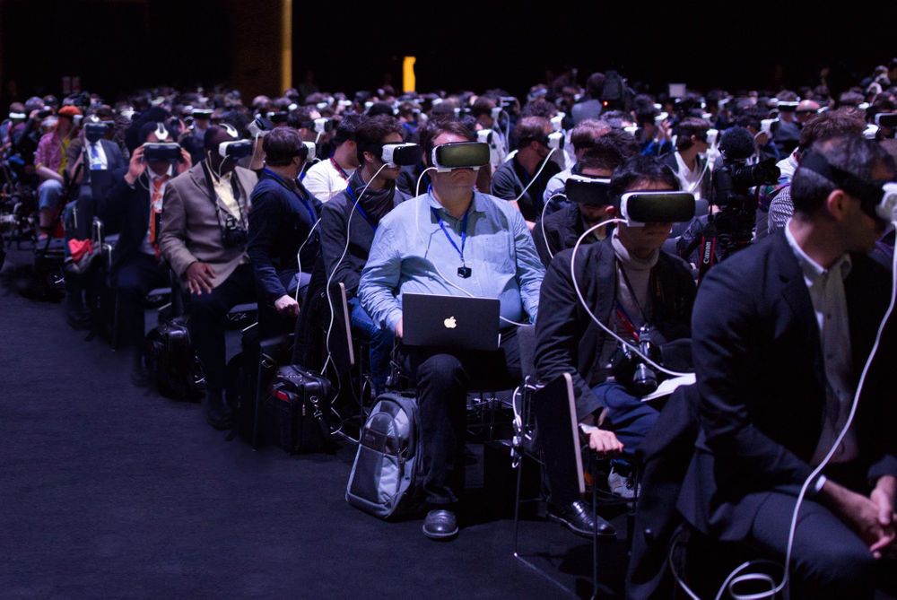 Meeting attendees of Facebook developer conference wearing VR headsets