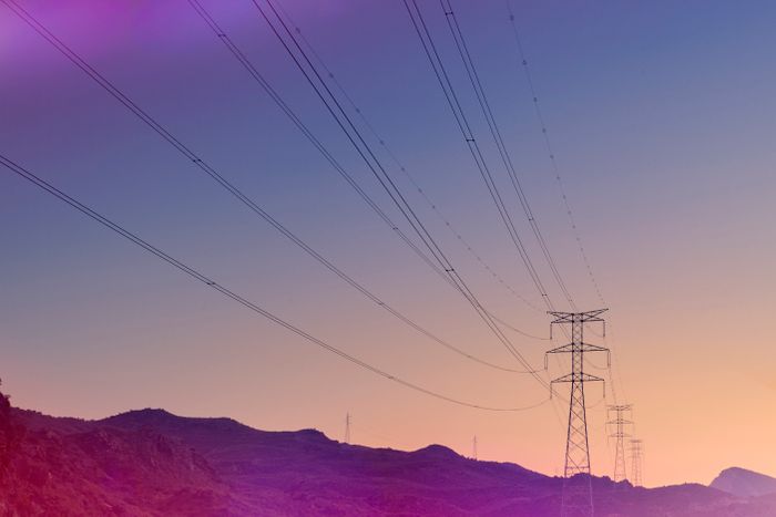 electricity pylons at sunset 