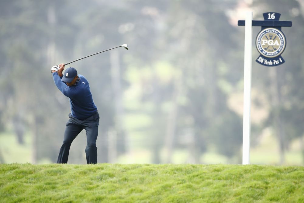 Tiger woods hitting a golf shot