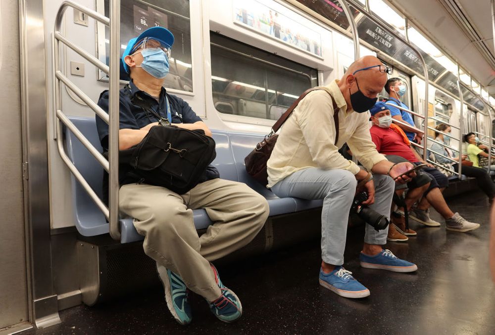 Masked riders on the subway 