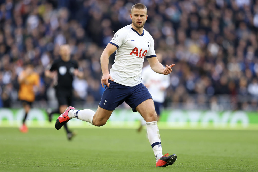 Eric Dier running in a soccer game