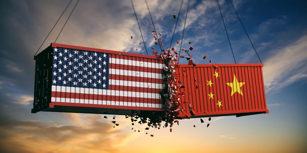 An illustration of two cargo containers colliding; one is painted with the U.S. flag, one with China's