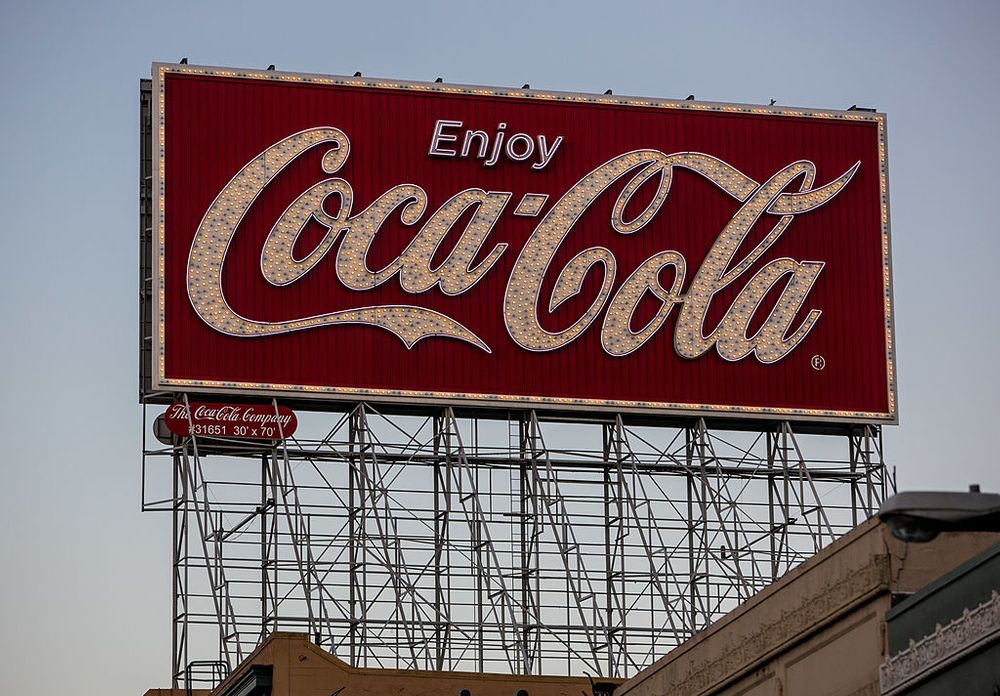 Billboard saying Enjoy Coca-Cola