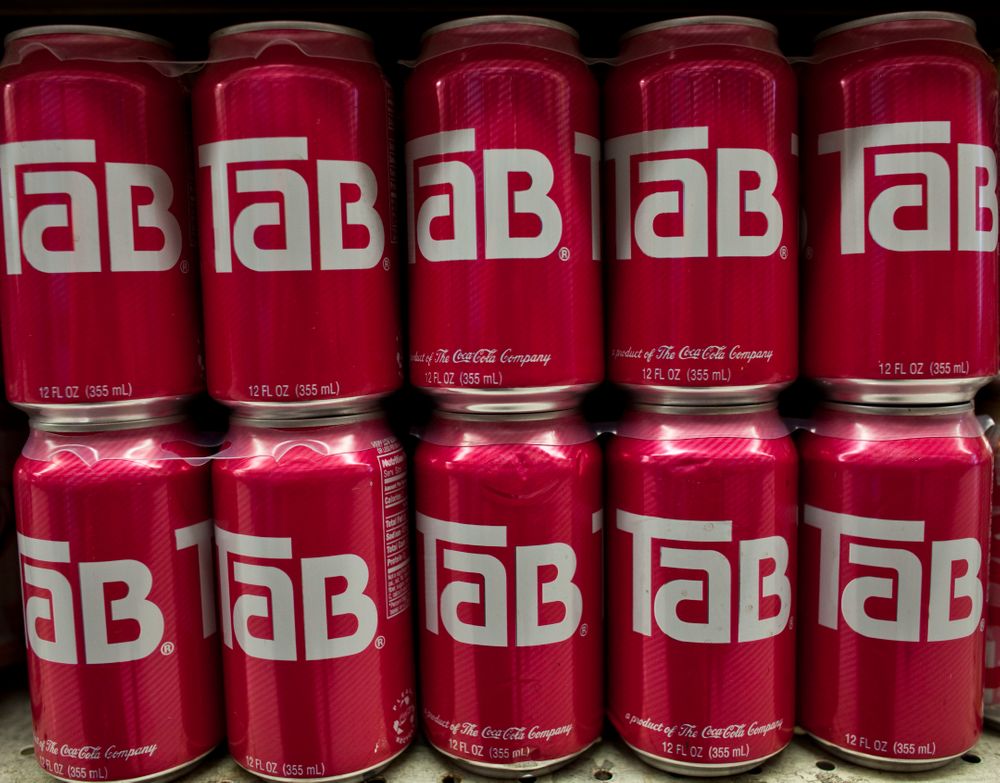 Cans of diet cola Tab brand soft drink produced by the Coca-Cola Company...