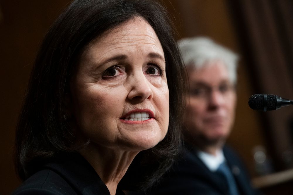 A close up photograph of Judy Shelton testifying before the Senate Banking committee in February. 