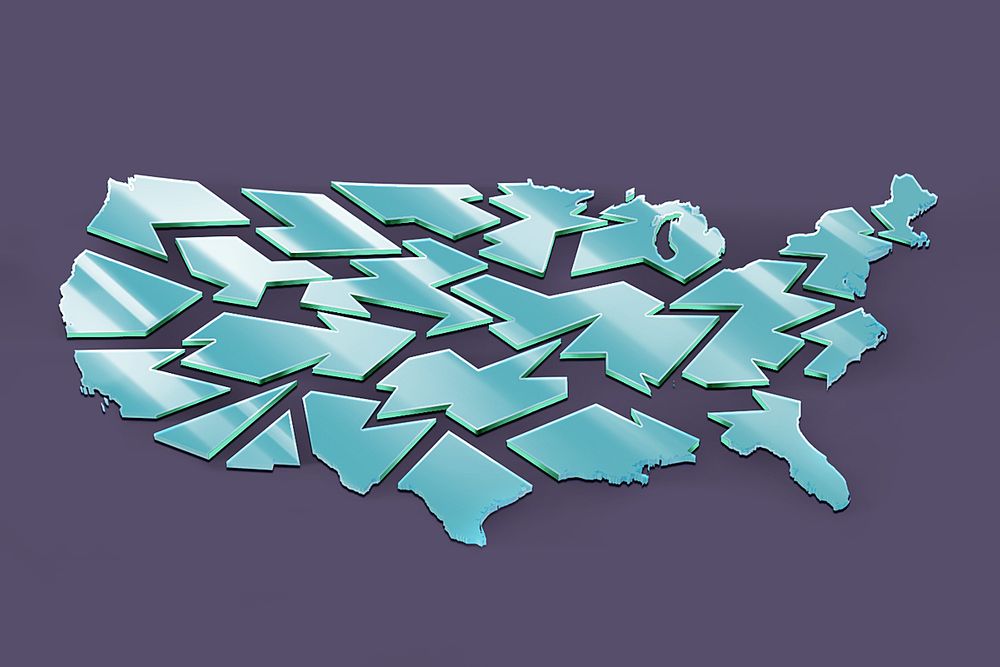 An illustration of the US map made up of broken shards of glass