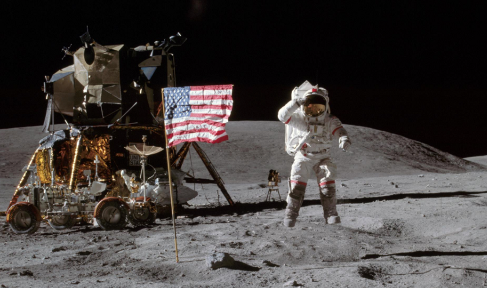 Astronaut John Young leaps from lunar surface to salute flag