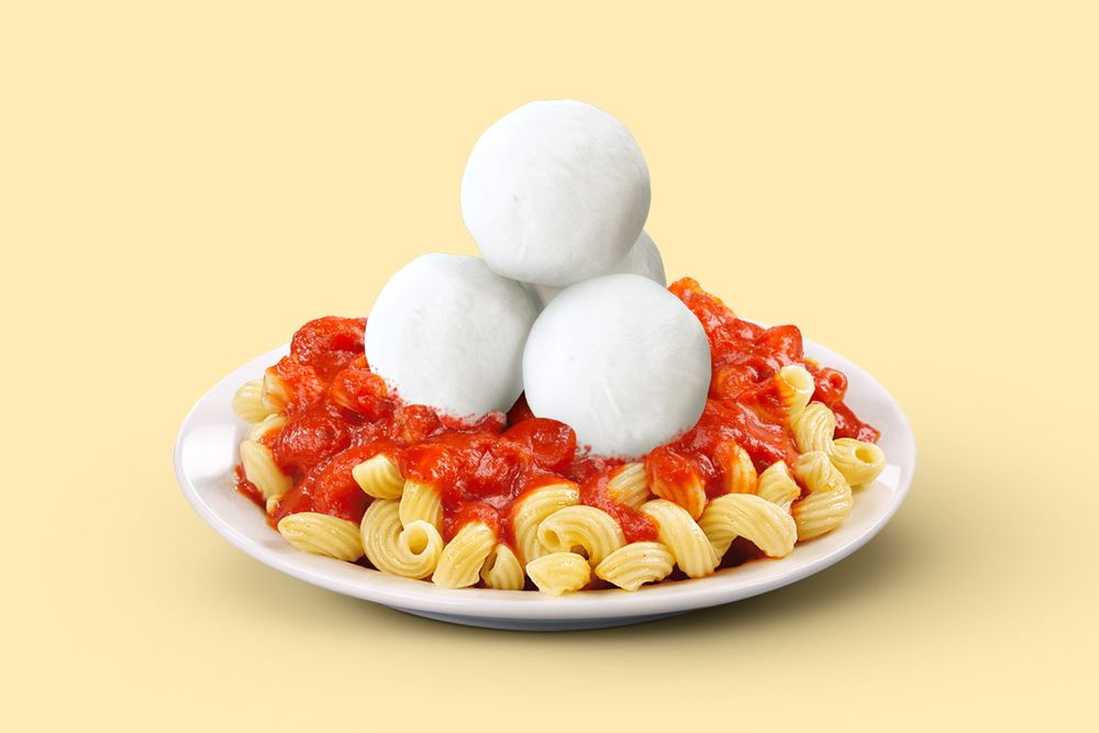 Plate of pasta topped with snowballs