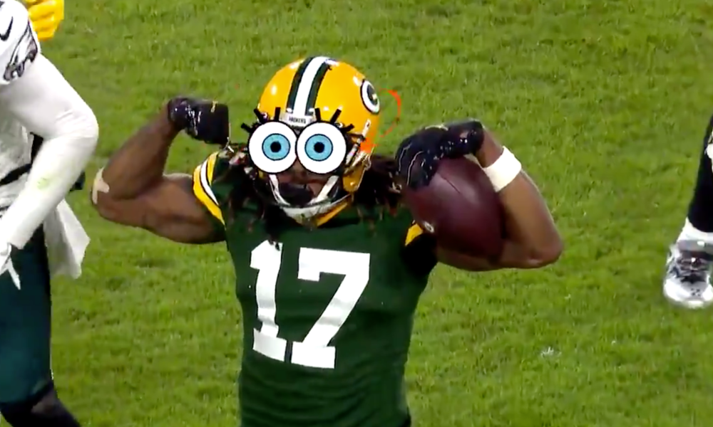 A photoshopped image of Green Bay wide receiver Davante Adams flexing his arms; Spongebob's cartoon eyes are photoshopped onto Adams's helmeted head.