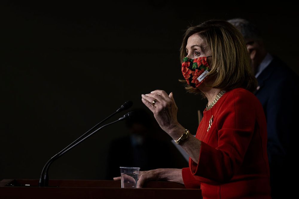 Nancy Pelosi doing a press conference about the economic stimulus