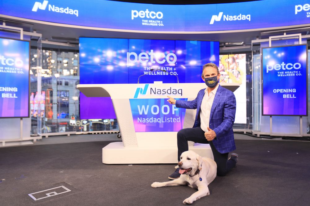 Petco IPO: Petco CEO Ron Coughlin and Yummy the labrador at the Nasdaq