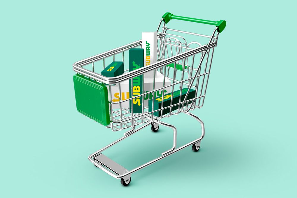 Shopping cart piled with licensed Subway food